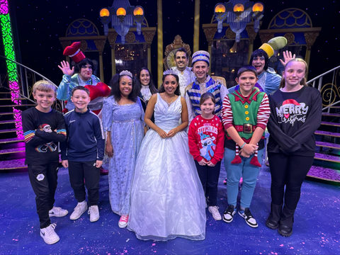 Children from Kirkheaton Primary School with the cast of Cinderella 