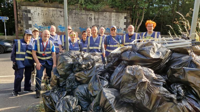 Employees team up to litter pick local streets and help foodbank X1