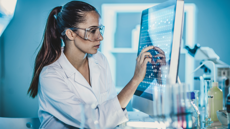lab worker on a computer